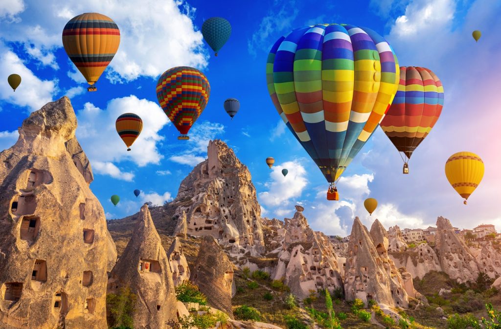 Colorful hot air balloon flying over Cappadocia, Turkey.